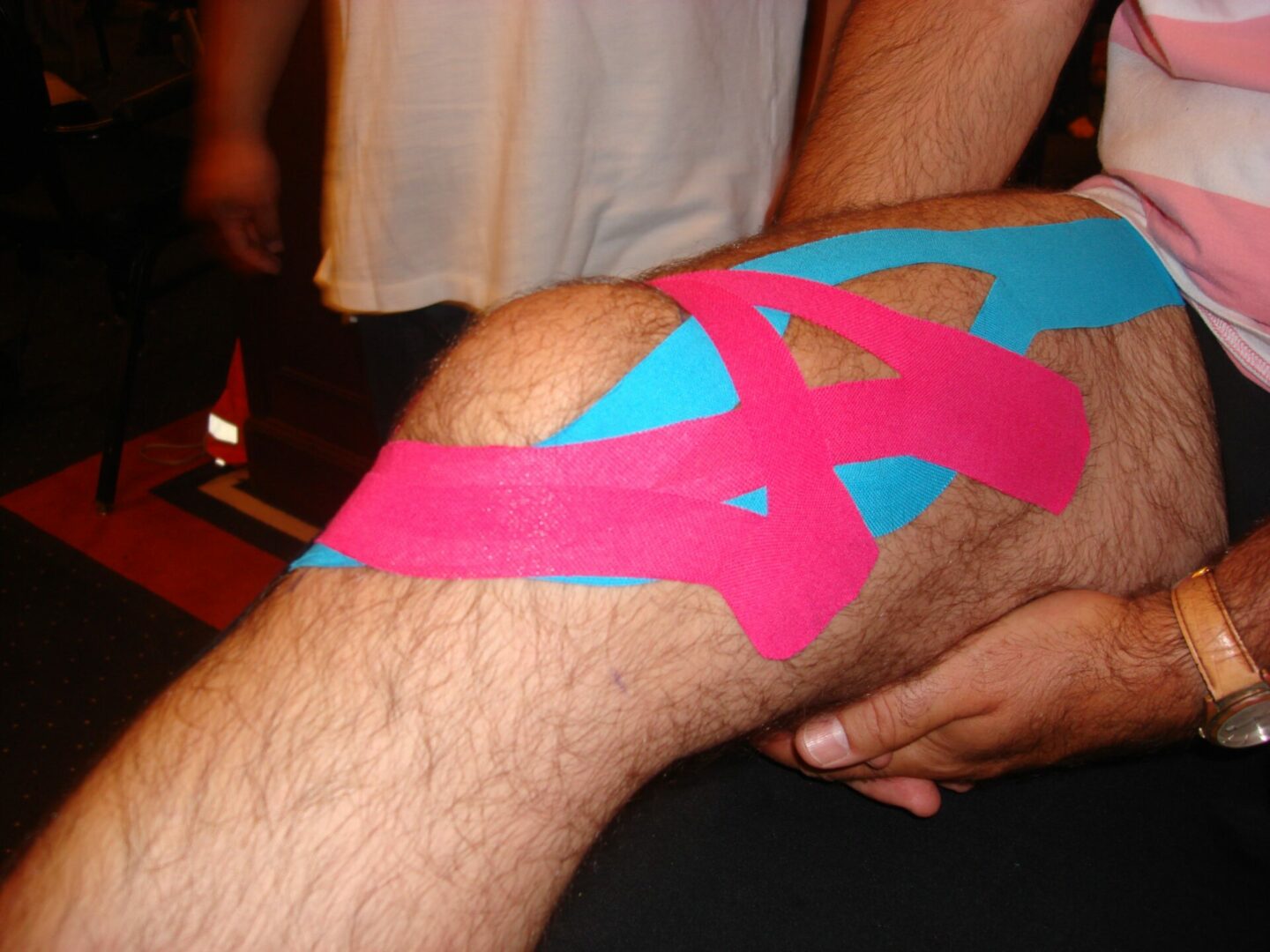 Human leg with medical tape 2024 11 27 20 35 11 utc